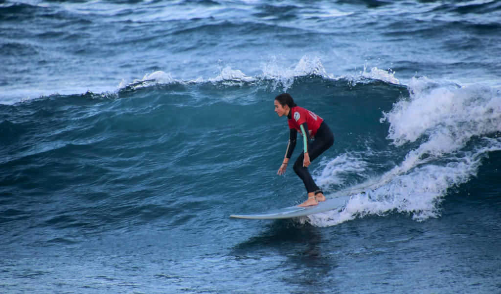 Surfer riding a wave in Tenerife.