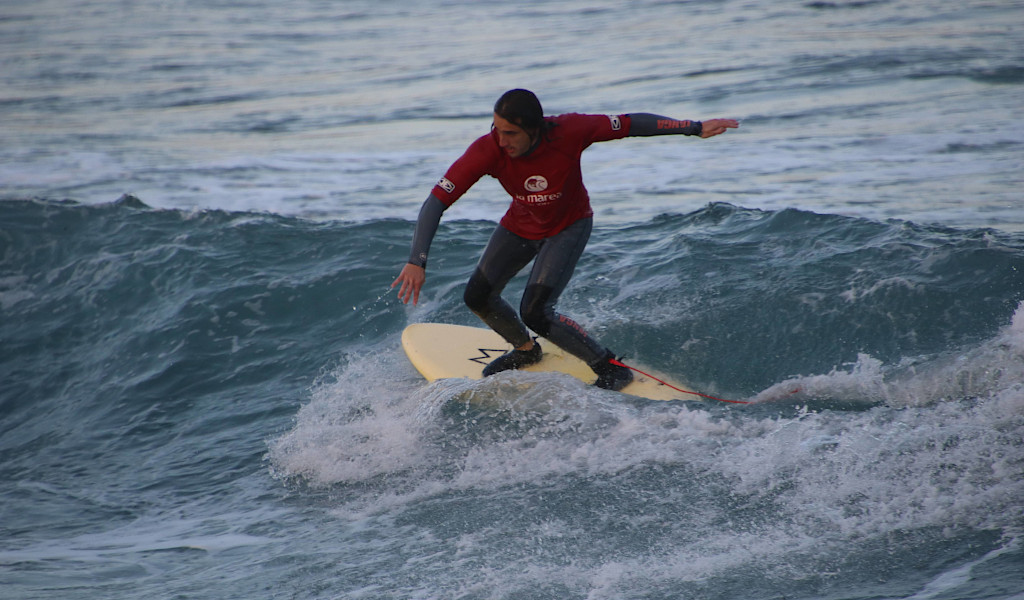 Surfer on a wave off the coast of Tenerife.