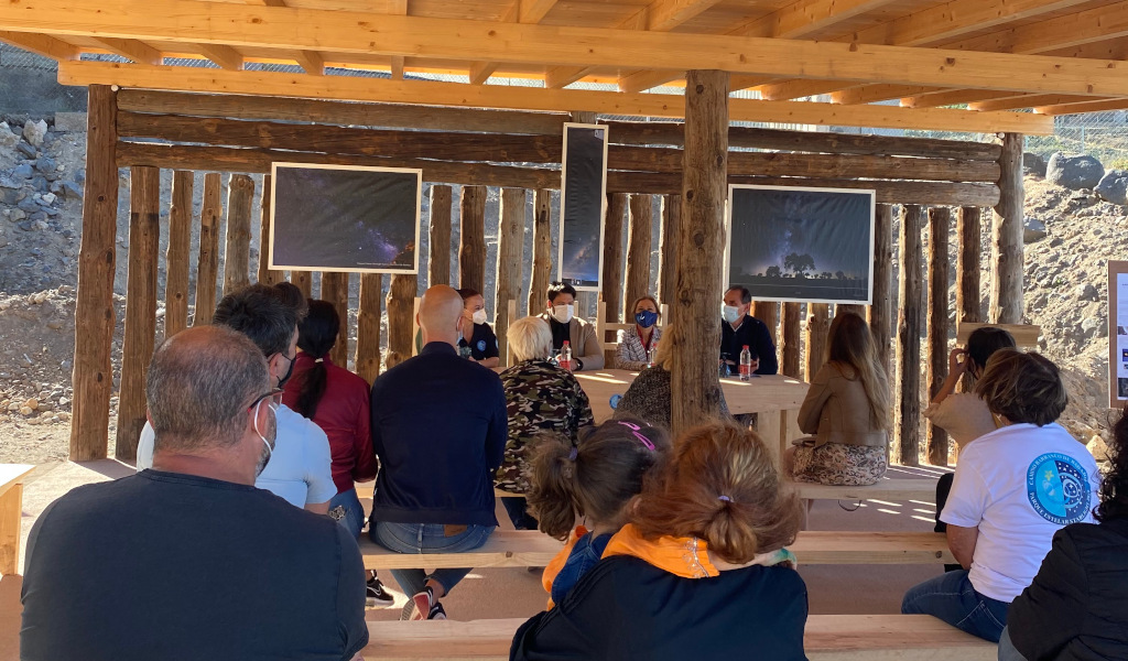 People attending a conference in an outdoor location in Tenerife.