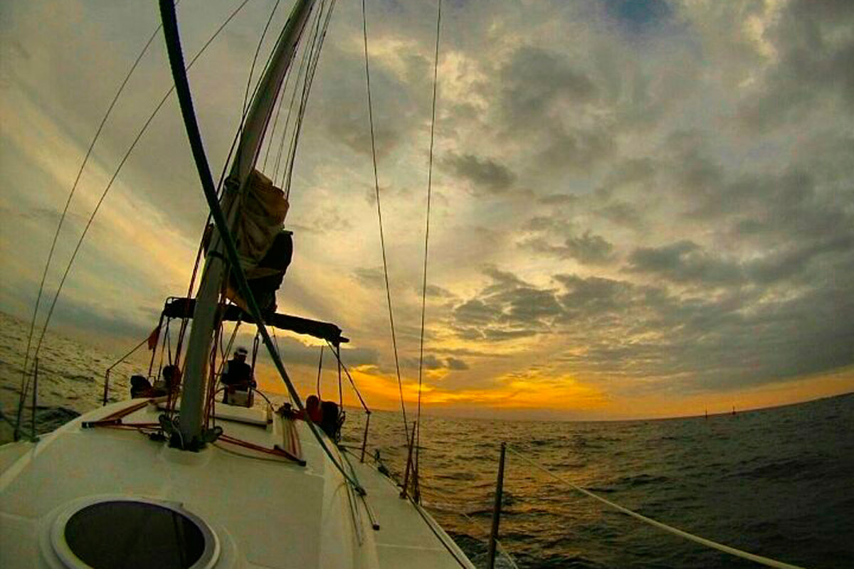 Sailing at sunset on the sea near Tenerife.