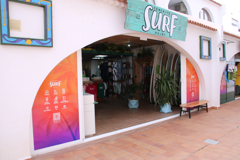 Surf shop Tenerife with boards and clothing on display.