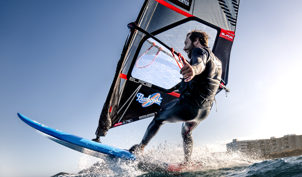 Person windsurfing on the coast of Tenerife.