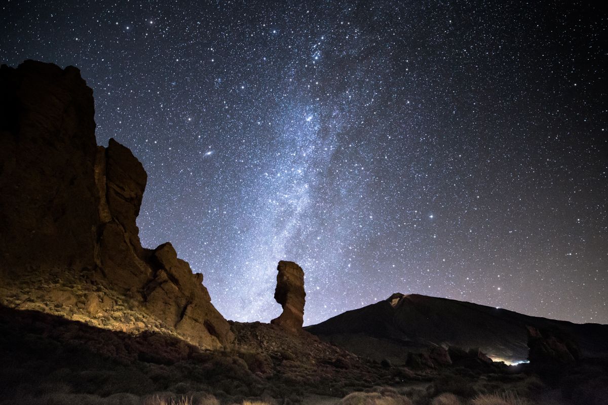 Starry sky over the landscape of Mount Teide in Tenerife.