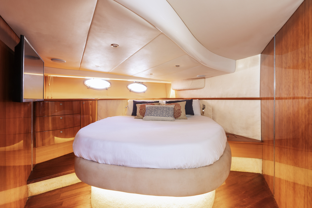 Bed with cushions in yacht room in Tenerife.