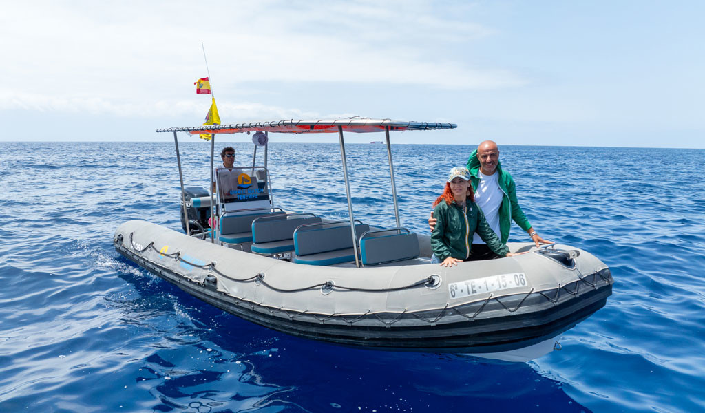 People in an inflatable boat over the sea in Tenerife.