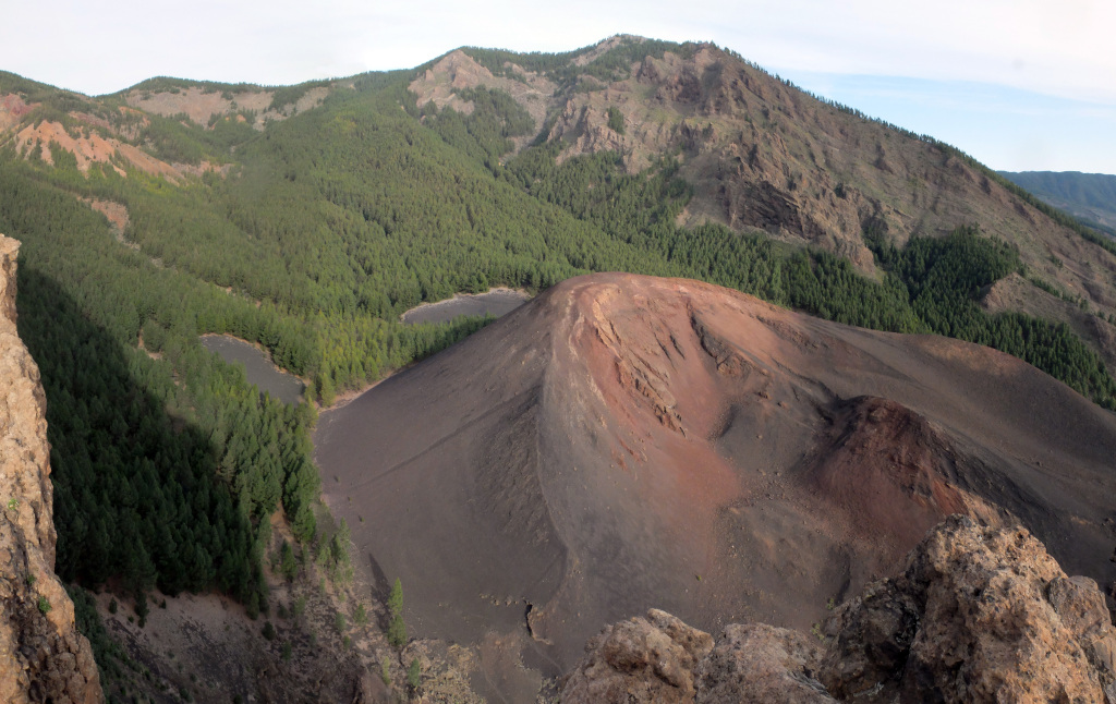 View of the volcanic crater surrounded by forest in El Hierro, Tenerife.