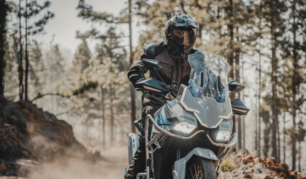 Motorcyclist driving on a dirt road in Tenerife.