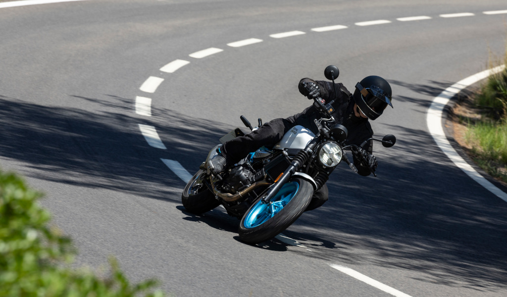 Motorcyclist taking a curve on the road in Tenerife.