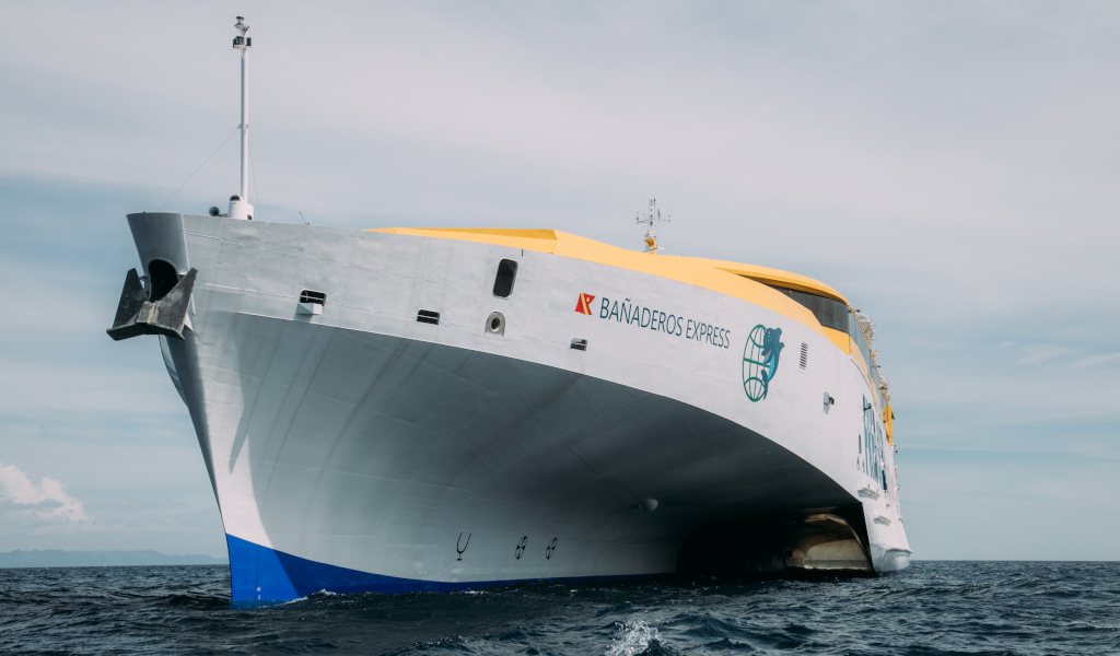 Ferry Bañaderos Express sailing near the coast of Tenerife.