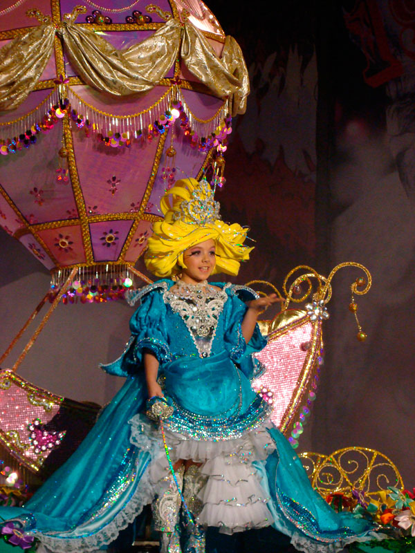 Girl in colorful carnival costume in Santa Cruz de Tenerife.