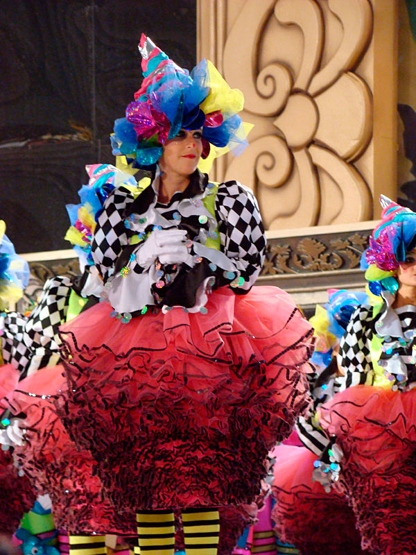 Person in colorful carnival costume in Tenerife.