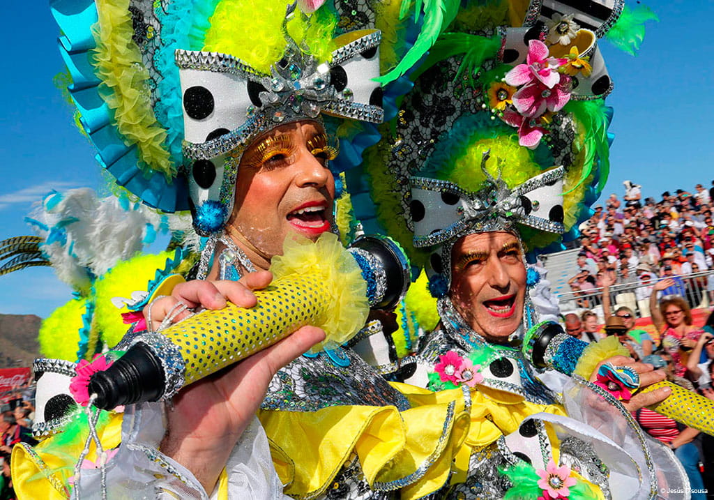 People in costumes singing at the Carnival of Tenerife.
