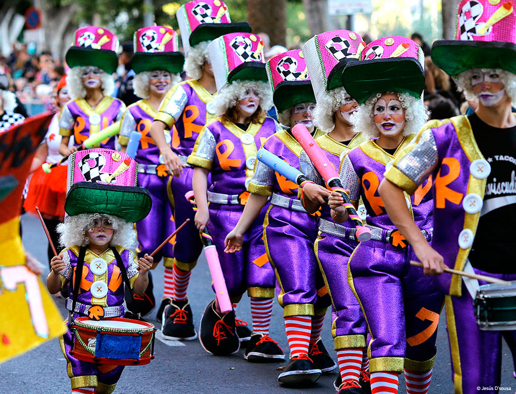 Group of people in costume at a carnival parade in Santa Cruz, Tenerife.