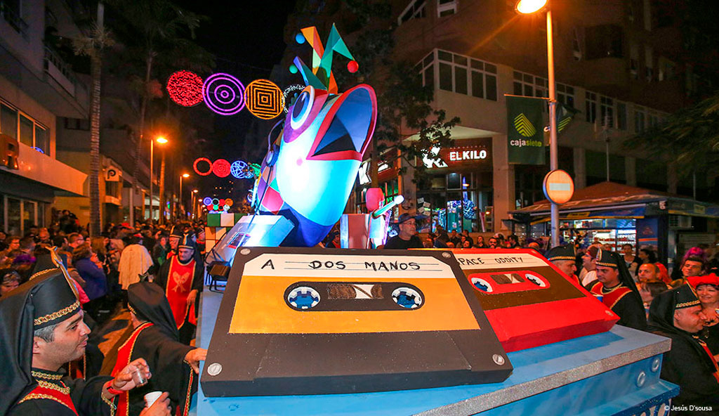 Colorful float at the Carnival of Tenerife with decorative ribbons.