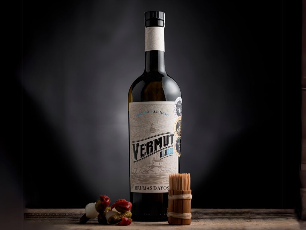 Bottle of Brumas Dayos White Vermouth on a dark background in Tenerife.
