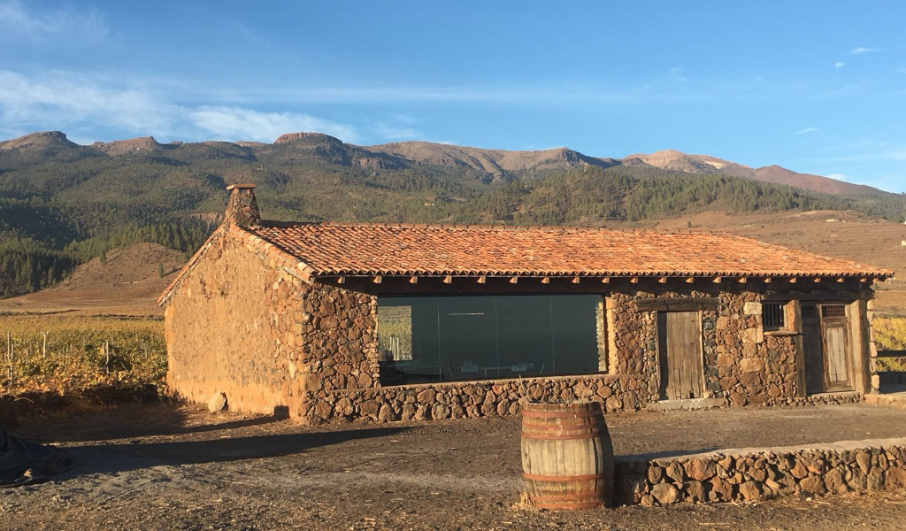Stone house in the mountainous landscape of Tenerife.