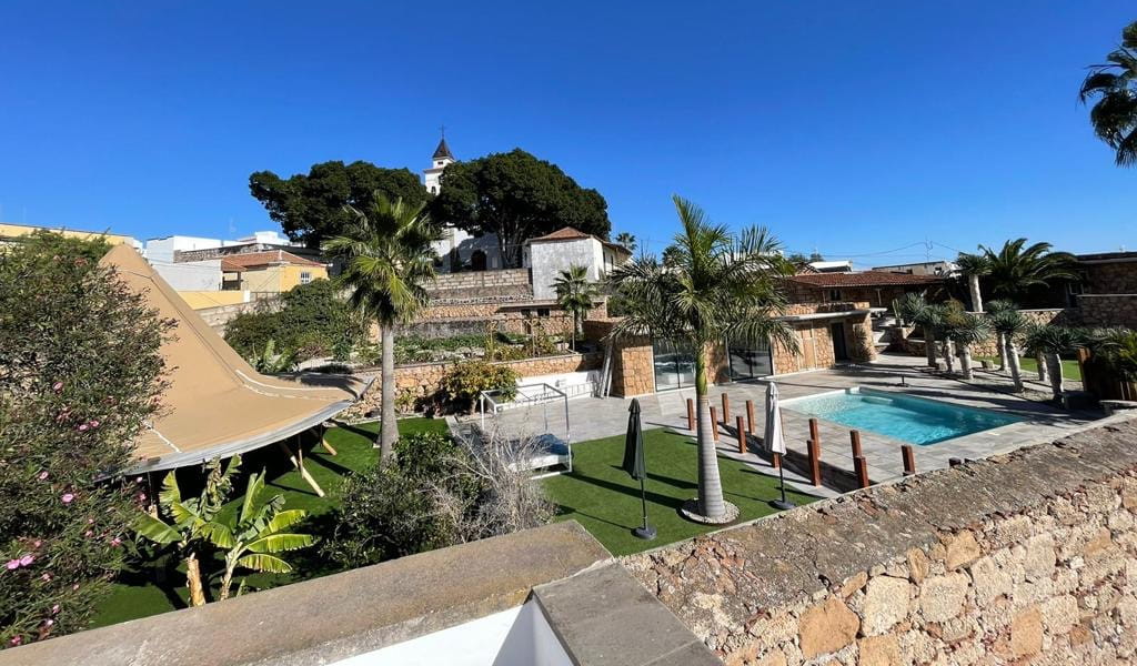 Outdoor area with pool and gardens in San Miguel de Abona, Tenerife.