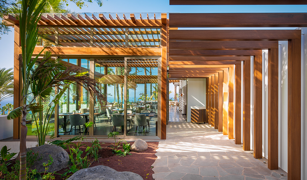 Entrance of a restaurant with terrace and sea views in Tenerife.