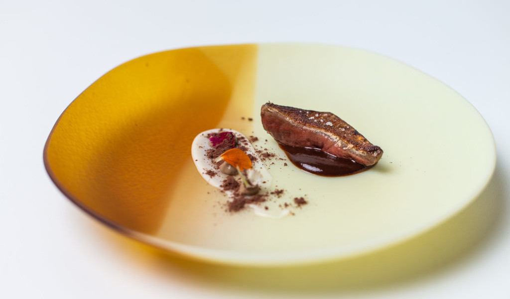Gourmet dish with roast meat and cream in a restaurant in Tenerife.