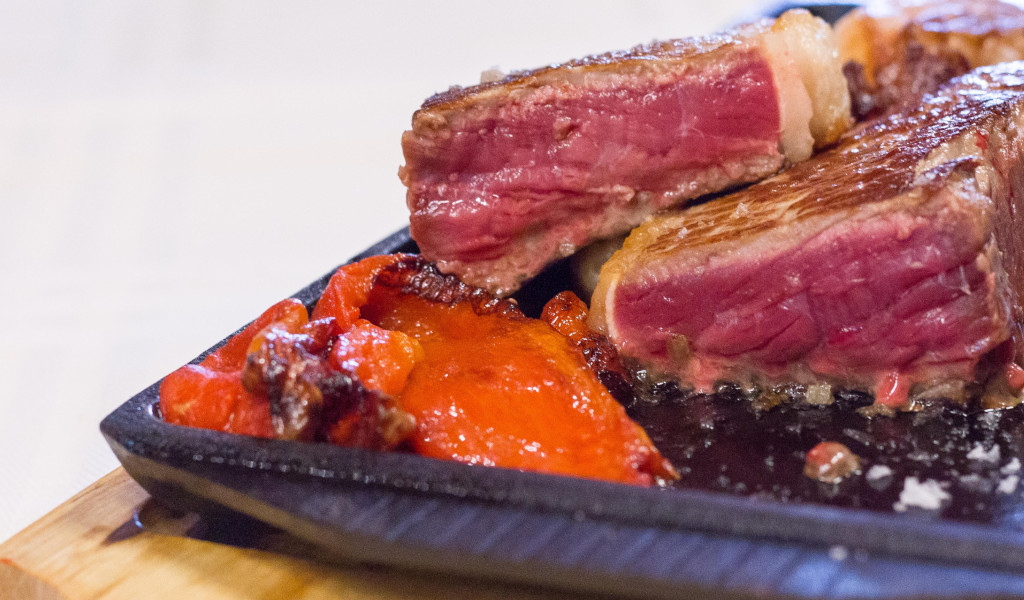 Juicy meat and pan-roasted peppers, a typical dish of Tenerife.