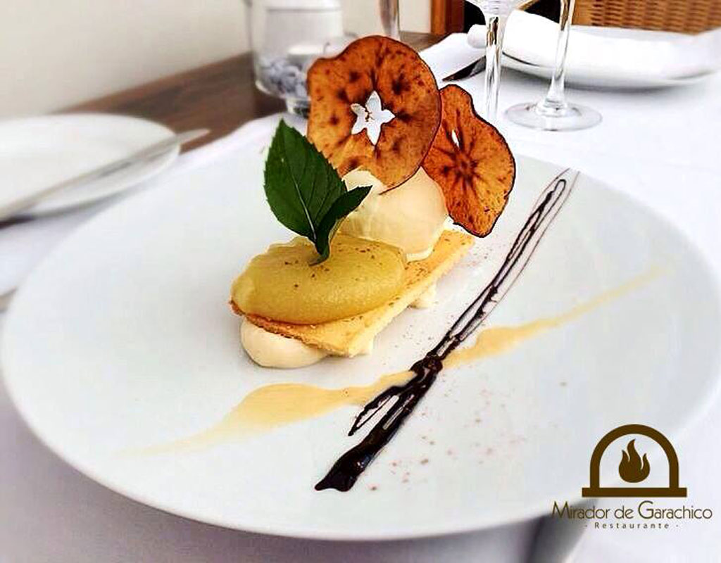 Gourmet dessert with cream, ice cream and apple slices at Mirador de Garachico.