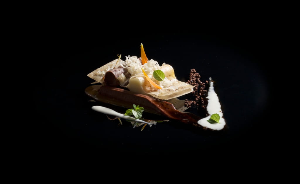 Gourmet dish with textures and artistic presentation in Tenerife.
