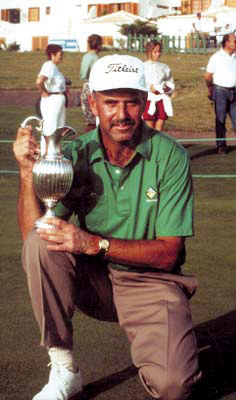 Person with a trophy on a golf course in Tenerife.