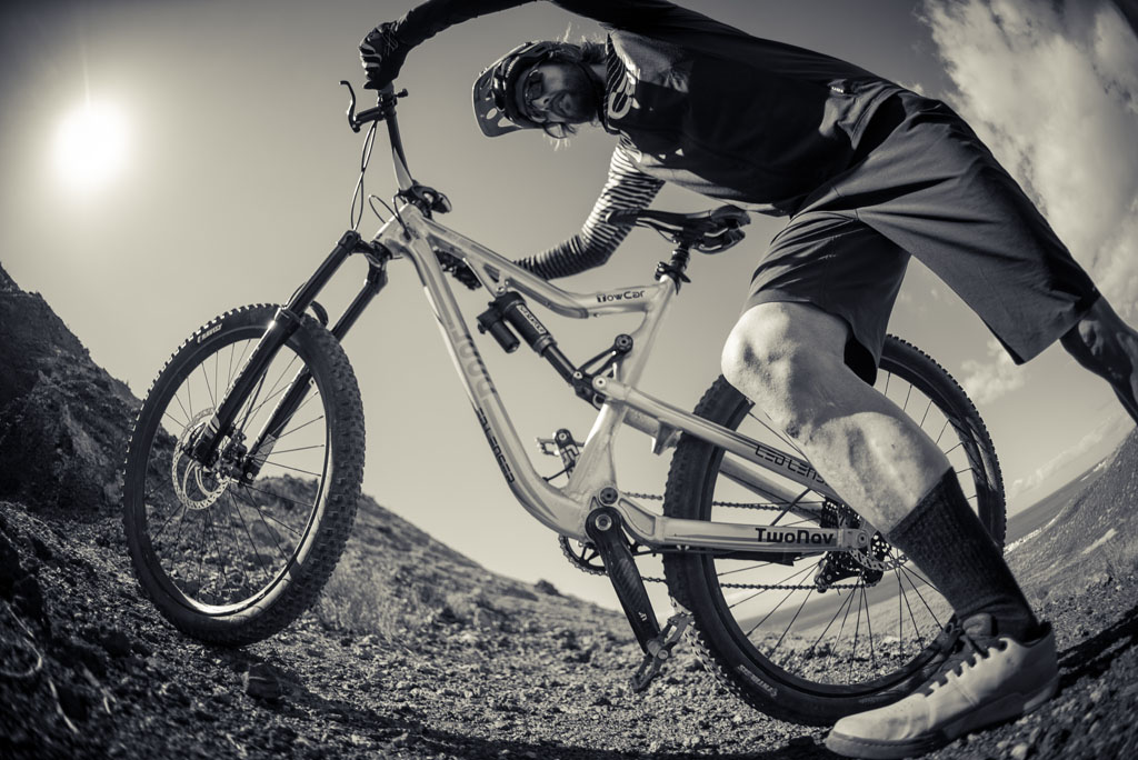 Person riding a mountain bike on a trail in Tenerife.