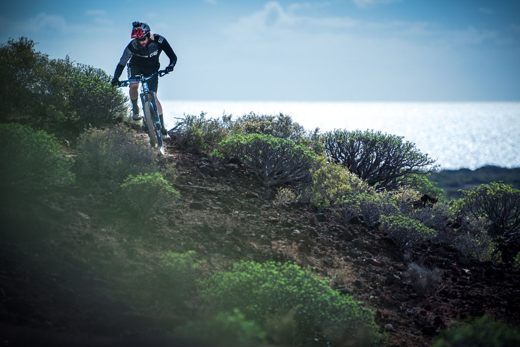 Cyclist on a trail near the coast in Tenerife.