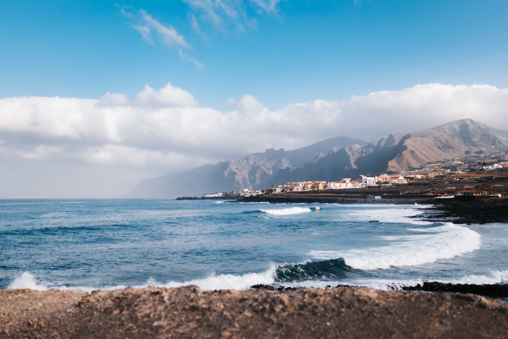 Costa de Buenavista del Norte with waves and mountains in the background in Tenerife.