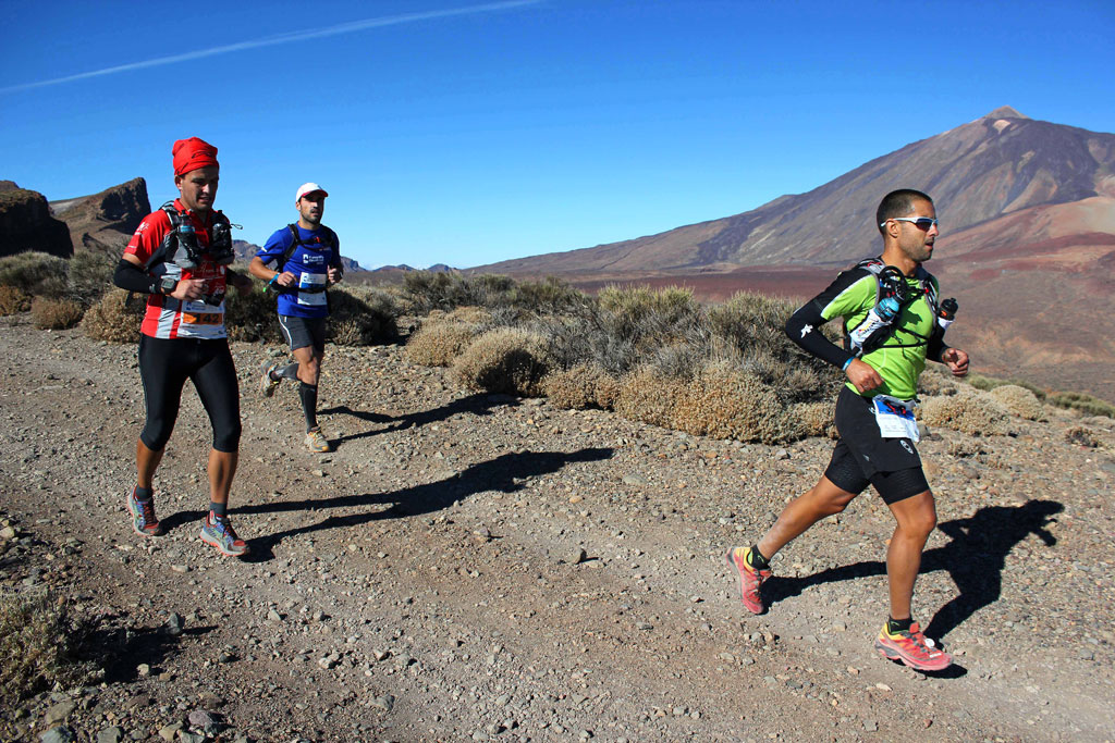 Runners participating in a mountain race in the Teide National Park, Tenerife.