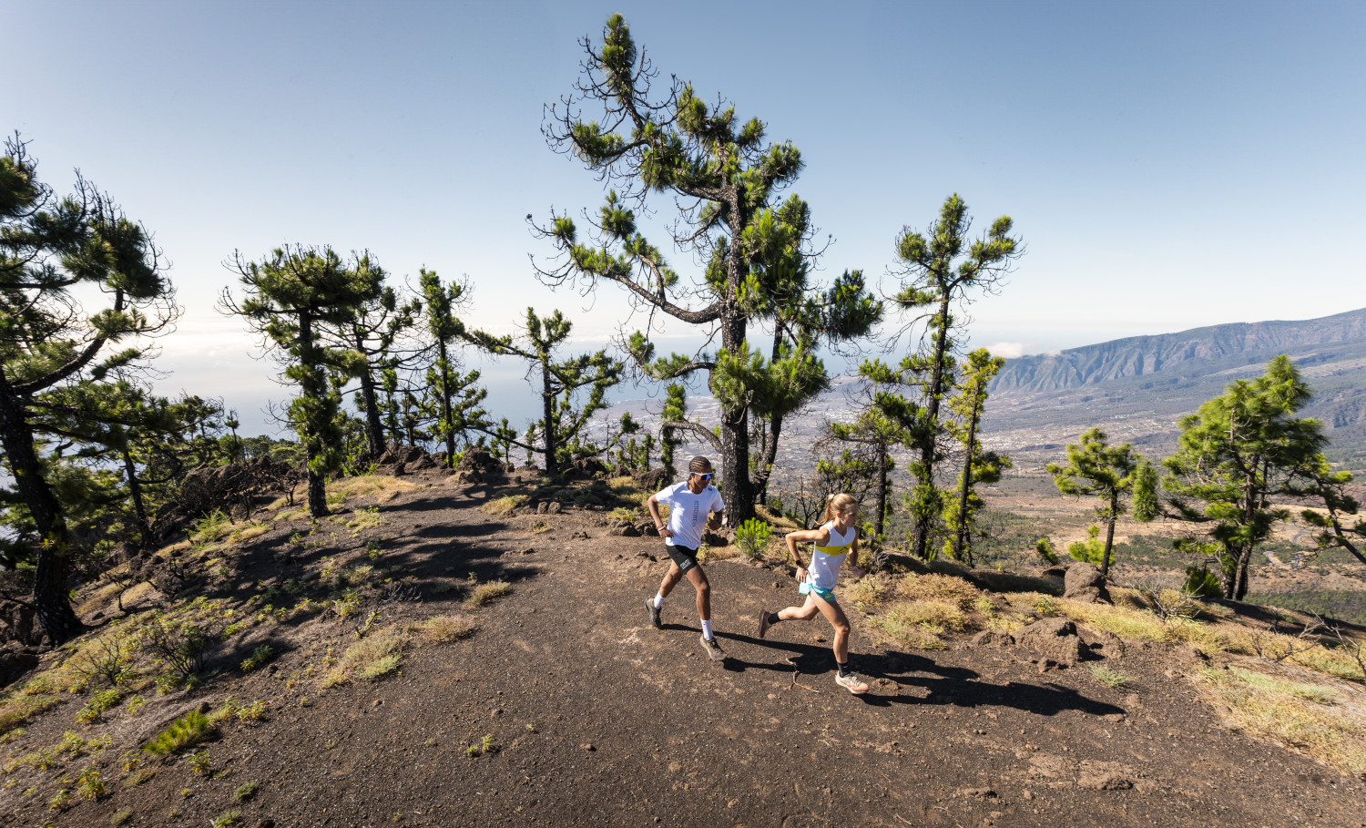 Runners on a trail in Teide National Park, Tenerife.