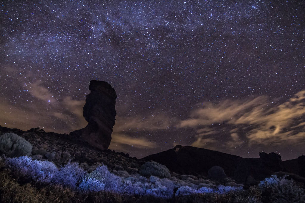 Starry sky over rock in the Teide National Park, Tenerife.