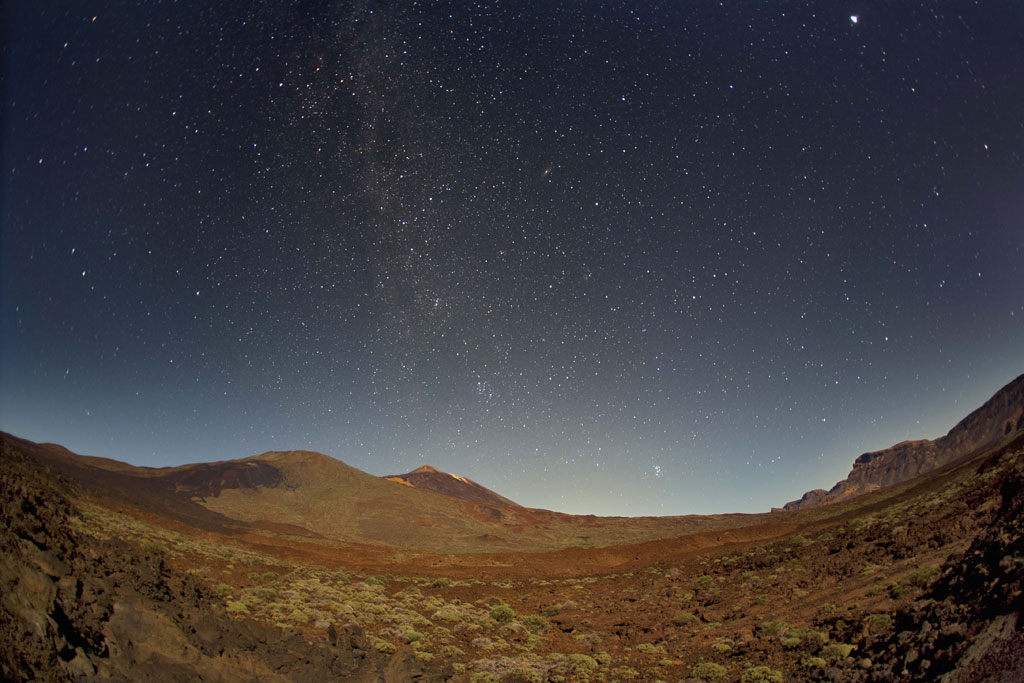 Starry sky over the landscape of Teide National Park in Tenerife.