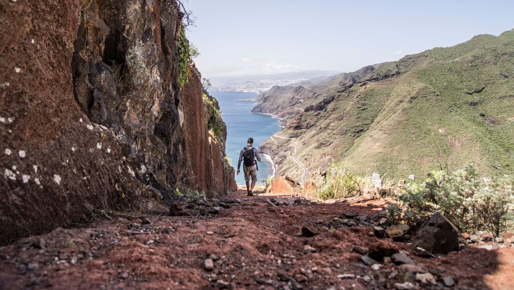 Person walking along a path to the sea in Anaga Rural Park, Tenerife.