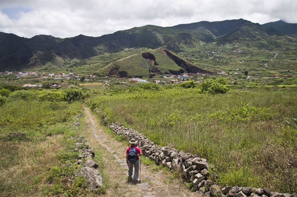 Trail to a village in the valley surrounded by mountains in Tenerife.