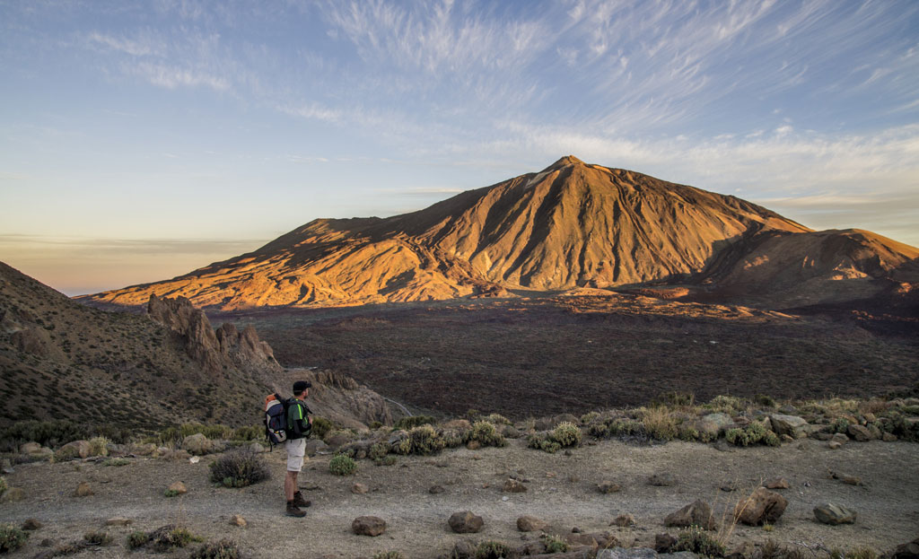 Person walking on a trail in Teide National Park, Tenerife.