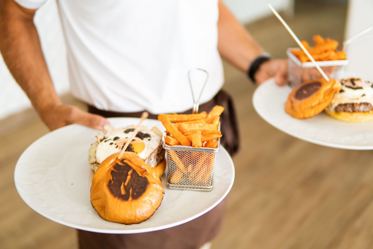 Plates of burgers and fries served in Tenerife.