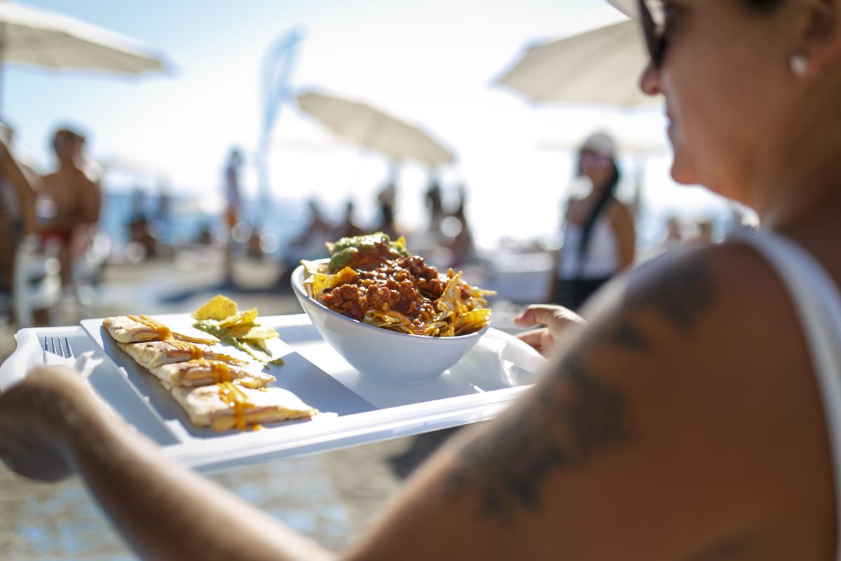 Dish with nachos and quesadillas served on the beach in Tenerife.