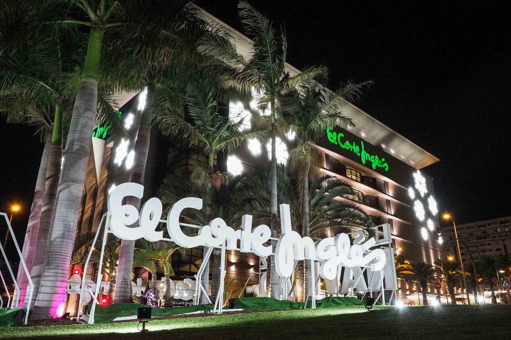 El Corte Inglés building illuminated at night in Tenerife.