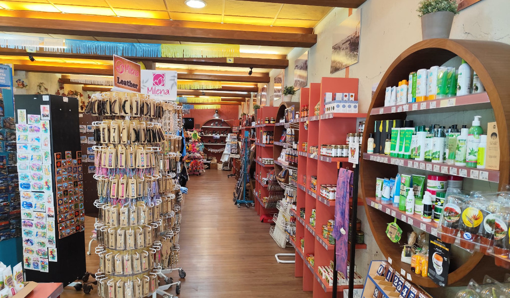 Souvenir shop and local products in Tenerife with shelves full of items.