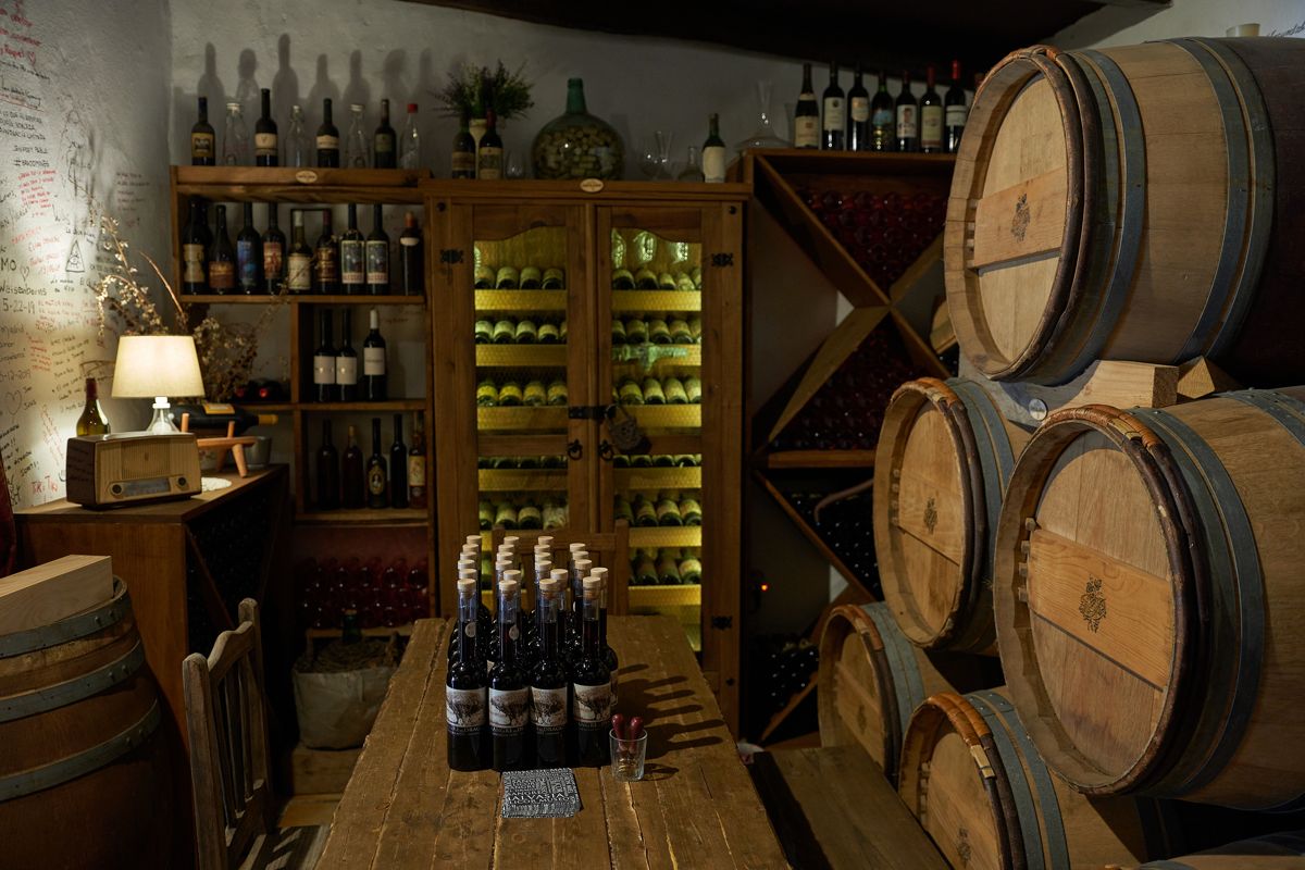 Tasting room with bottles and barrels of wine in Tenerife.