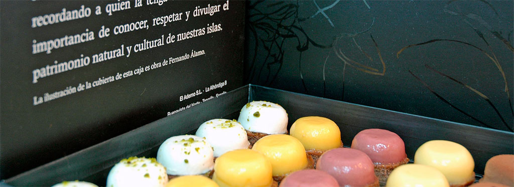 Coloured sweets in a box with text on the importance of natural and cultural heritage.