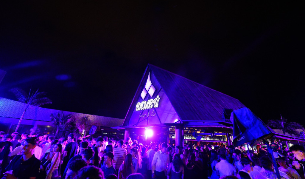 Crowd enjoying abroad outside a nightclub in Tenerife.