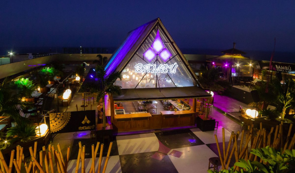 Bamboo Lounge & Bar lit up at night in Tenerife.