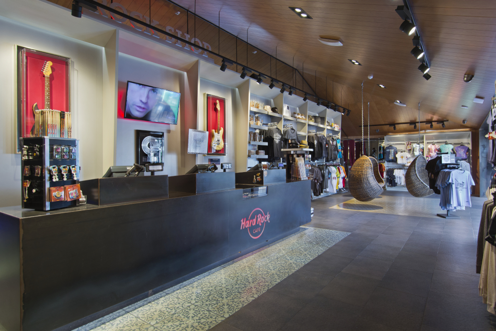 Gift shop inside the Hard Rock Café in Tenerife, with guitars and clothes on display.