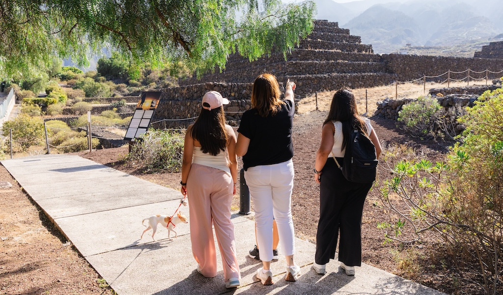People walking through the Pirámides de Güímar Ethnographic Park in Tenerife.