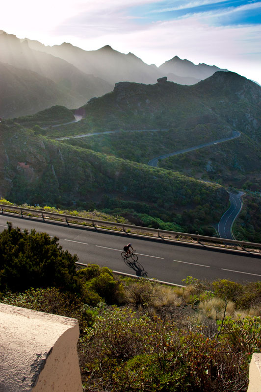 Cyclist on a mountainous road in the Anaga Rural Park, Tenerife.