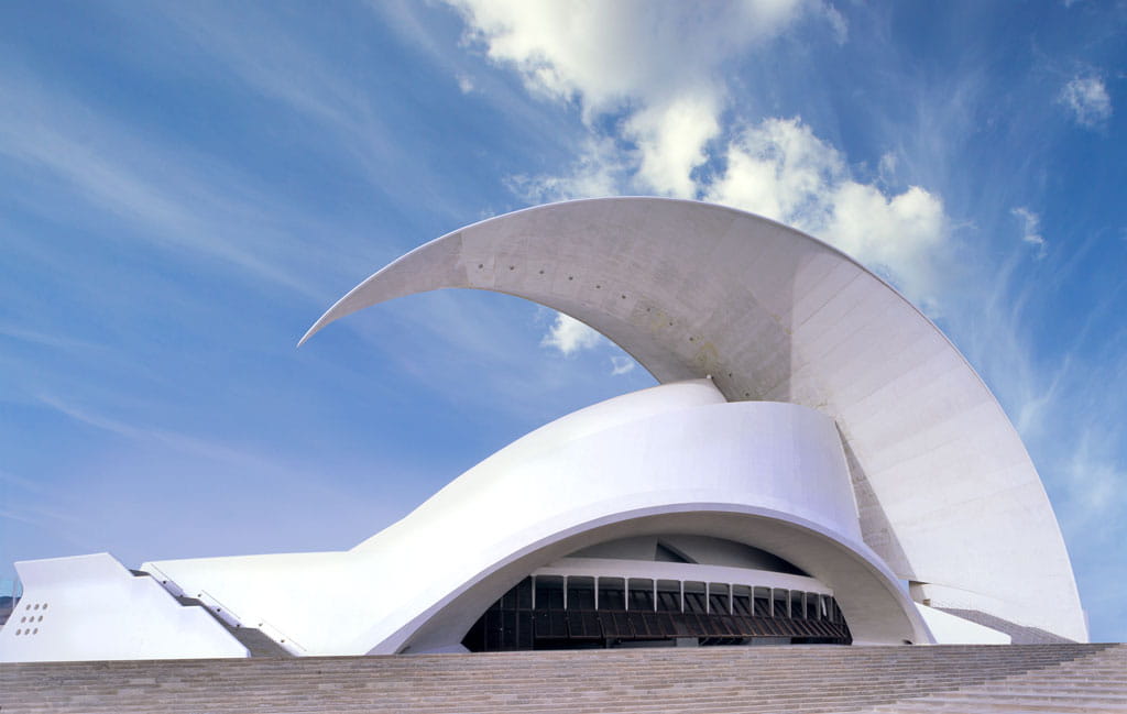 Auditorio de Tenerife with blue sky and clouds.