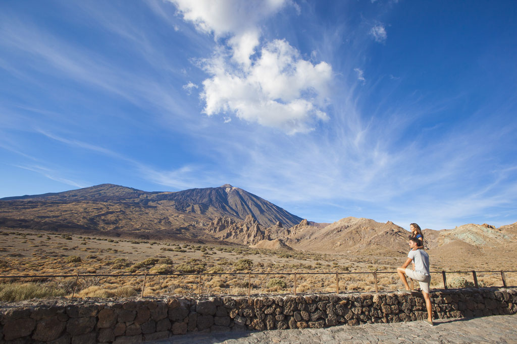 Person looking at Mount Teide from a viewpoint in Tenerife.